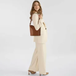 Discount Coccinelle Nikla Beuteltasche Leder 18 cm cognac-noir